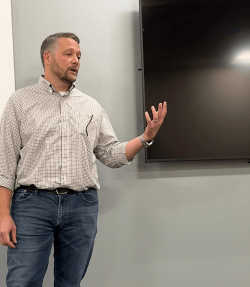 a picture of Andy McQuade speaking at RIT's Real Estate Club