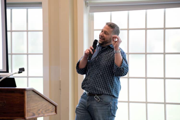 a picture of Andy McQuade speaking at his local real estate investors meetup